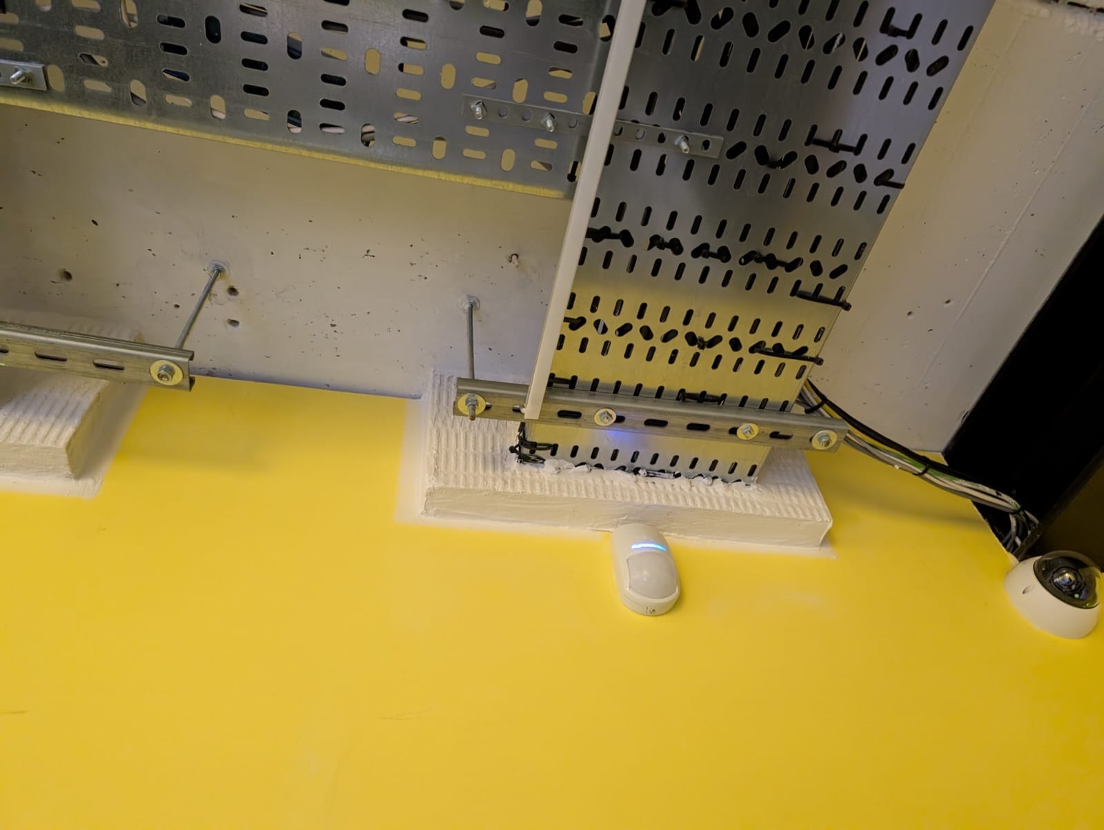 Ceiling cable trays with motion sensor and camera